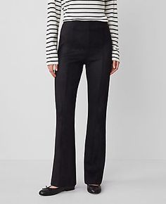 Elevate your wardrobe with the Ann Taylor Faux Suede Skinny Flare Pants, a chic blend of contemporary design and classic elegance. These pants are meticulously crafted to enhance your silhouette, featuring a high-rise waist that sits just below the natural waistline, and a flare leg that begins at the knee for a dramatically stylish finish.

- Size: 10
- Color: Black
- Material: 96% Polyester, 4% Spandex
- Fit: Tailored and fitted with a flared leg
- Length: Full length with a 31" inseam and 18 Women's Black Dress, Flare Pant, Flared Pants, Dress Pant, Classic Elegance, Flare Pants, Stylish Women, Effortless Style, Side Zipper