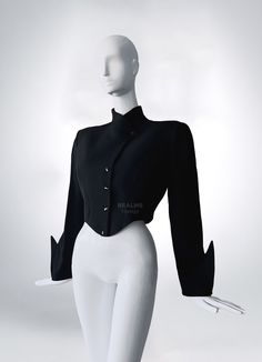 Fabulous extremely rare Collector's Piece

Thierry Mugler black cropped jacket, FW 1988/89 Collection.

Dramatic black jacket - a stunning Thierry Mugler creation. 
Extraordinairy sleeves with pointy shark fin details.
Dramatic feminine silhouette with asymmetric pointy construction. Typical signature style for his famous 88/89 Collections. Vintage Mugler Jacket, Custom Mugler, Mugler 2020, Vintage Mugler, Mugler Black, Black Cropped Jacket, Orange Jacket, Shark Fin, Press Tour