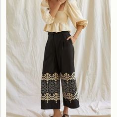 With An Abstract, Tonal Motif, These Wide-Legs Bring A Dash Of Artful Flair To Your Seasonal Wardrobe. Pair Them With A Sweetly Ruffled Blouse For An Ensemble That’s Destined To Thrill. Cottonembroidered Embellishmentside Slant Pocketswide-Leg Silhouettefront Zip Dimensions12" Rise26" Inseam32" Leg Openinginside Label Marked To Prevent Store Returns Chic Embroidered Straight Pants, Chic Embroidered Trousers, Chic Embroidered Wide Leg Pants, Chic Wide Leg Embroidered Pants, Elegant Embroidered Summer Pants, Elegant Embroidered Black Bottoms, Elegant Black Embroidered Bottoms, Chic Embroidered Summer Pants, Fitted Embroidered Pants For Workwear