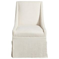 an upholstered chair with a white linen cover on the bottom and back side