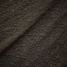 black fabric textured up close to the ground with no visible lines or dots on it