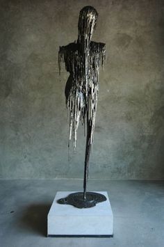 a sculpture is shown with icicles on it