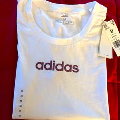 Addidas T-Shirt Brand New W/Tags Size M Purple Gliter Lettering Pit To Pit 17’ White Adidas Tops For Spring, Casual White Adidas Tops, Summer Adidas Crew Neck Top With Logo, White Adidas Logo Casual Tops, Adidas White T-shirt For Spring, White Adidas T-shirt For Spring, Basic White Adidas Tops, Casual White Adidas Logo Tops, White Adidas T-shirt For Summer