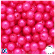 close up view of bright pink plastic beads