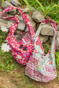 This awesome hippie handbag features two block print tapestry prints, so you can have one bag to go with everything! With a patch pocket on both sides, this retro tote is two handbags in one! These huge reversible hippie bags are ideal for carrying groceries or as a general tote, and the strap is long enough to wear comfortably as a crossbody bag. 100% cotton 2 pockets inside and outsideMeasurementsDepth: 14", Width: 20", Strap length: 19" Reversible Bohemian Shoulder Bag, Bohemian Reversible Shoulder Bag, Bohemian Reversible Hobo Bag For Daily Use, Everyday Bohemian Cotton Hobo Bag, Bohemian Reversible Hobo Bag For Travel, Bohemian Reversible Hobo Tote Bag, Bohemian Reversible Cotton Bag, Bohemian Reversible Hobo Bag For Everyday Use, Hippie Cotton Bags For Everyday Use