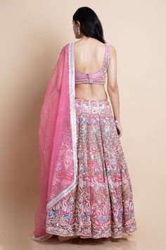 Editor's Note Featuring a rose pink lehenga set in organza The dupatta features a fully embroidered seamless border with scattered sequins embroidery. Color: Rose Pink Fabric: Organza Care: Dry Clean Only Customize Your OutfitCan't find the size you're looking for? No stress. Just select the size "Custom" while adding the item to your cart. We will follow up with you for your body measurements. To request a color or design customizations, please contact our customer care by using our "Ask us a q Rose Pink Lehenga, Pink Lehenga, Embroidered Lehenga, Silk Lehenga, Embroidered Neckline, Sequins Embroidery, Silk Organza, Blouse Online, Crop Blouse