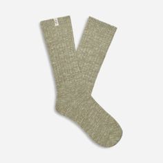 These ultra-soft knit socks are a fan favorite. The Rib Knit Slouchy Crew sock is the perfect combo of texture and style. | Soft knit crew sock. 99% Recycled Polyester/1% Elastane. 11 inch height. Soft twill tape with The UGG® Logo on top cuff. Fits shoe size: 5-10. Imported. | UGG® Women's Rib Knit Slouchy Crew Sock Polyester Blend/Recycled Materials Socks in Moss Green/Grassland Ugg Socks, Crew Sock, Moss Green, Womens Uggs, Knit Socks, Twill Tape, Christmas List, Soft Knits, Socks Women