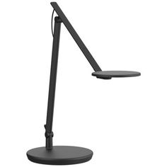 a black desk lamp on a white background