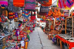 an outdoor market with lots of colorful items