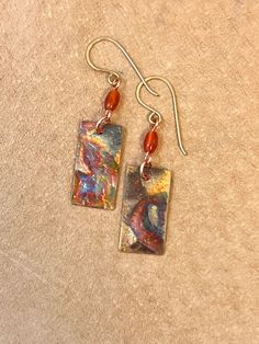 Handmade Rectangular Copper Earrings, Artistic Gold Earrings With Patina, Rectangular Patina Jewelry As Gift, Artisan Rust-colored Earrings As Gift, Bohemian Brown Rectangular Earrings, Brown Rectangular Bohemian Earrings, Artistic Brown Copper Earrings, Red Bohemian Rectangular Earrings, Artistic Copper Earrings