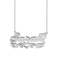 Bold, bright, and beautiful are the first words that come to mind when seeing this stunning rhodium beaded nameplate necklace. Completely covered in sparkle, the whimsical script, with beading and rhodium on the first letter, shines and is accented by the heart with beading and rhodium adorned tail that underlines the nameplate. The backdrop shadow draws even more attention to this shimmering 14K Yellow Gold Over Sterling Silver necklace by creating a contrast behind the beaded letter and making each letter pop. Feminine, fabulous and completely customizable, you can personalize this rhodium beaded nameplate necklace with up to 12 characters. Included with each charm is an 18" Link Chain that is fastened on both sides of the nameplate. For adult women. Size: one size.  Gender: female. Elegant Silver Heart Nameplate Necklace, Silver Heart Nameplate Necklace With Custom Name, Silver Heart Necklace With Custom Name Nameplate, Silver Custom Name Heart Necklace, Silver Nameplate Jewelry With Names, Silver Nameplate Necklace For Valentine's Day, Silver Elegant Heart Necklace With Custom Name, Elegant Silver Heart Necklace With Custom Name, Silver Heart Nameplate Necklace