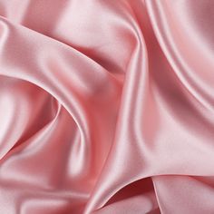 Mood's Premium Veiled Rose Silk Crepe Back Satin is a medium weight silk with a satin face and a creped weave on the reverse face. With an exquisite, full-bodied drape and a lovely sheen, make sumptuous dresses, blouses, skirts, and special occasion garments. Available in 95+ attractive shades. 

Note: Dye lots are subject to change up to 10% in either direction. Ordering swatches is HIGHLY recommended for these products. Formal Solid Color Satin Silk Scarf, Formal Solid Satin Silk Scarf, Solid Color Satin Silk Scarf, Silk Scarf With Satin Finish For Wedding, Satin Aesthetic, Silk Wallpaper, Mood Fabrics, Pastel Pink Aesthetic, Satin Roses