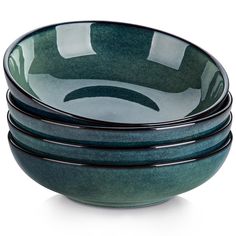 three green bowls stacked on top of each other