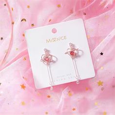 Description:Chic Heart Dangle EarringsSpecifications:Material: Eco-plated Copper, Cubic Zirconia, Crystal, 18k GoldSize: 4.8 cm * 1.2 cmWeight: 4.5 g/pair Upgrade your style game with our Chic Heart Dangle Earrings! These earrings are the perfect mix of cute and edgy, making them a versatile addition to any outfit. Show off your playful side and add a little love to your look with these dainty heart earrings. 💕 Heart-shaped Alloy Earrings For Party, Trendy Alloy Earrings As Gift, Heart-shaped Alloy Jewelry For Pierced Ears, Metal Crystal Earrings For Valentine's Day Gift, Trendy Dangle Heart Earrings For Wedding, Trendy Heart Dangle Earrings For Wedding, Valentine's Day Crystal Earrings For Pierced Ears, Valentine's Day Heart-shaped Alloy Earrings, Valentine's Day Party Earrings In Alloy