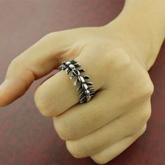 Challenge yourself with the Skeleton Spine Ring! Imbued with a bold personality, this daring piece of jewelry will give your look a daring edge. Take the plunge and show your daring side! BUY TWO & Get 3rd* item Free from our UNISEX Goth Jewelry Collection. *The Lowest Priced Item. Must add 3 items to the cart to see the discount applied at the check out. GENDER: UNISEX 316L Stainless Steel Not allergic, Does not rust, Not deformed Water, Heat, Sweat Resistant Hypoallergenic (No Green Skin) Spine Ring, Skeleton Spine, Spine Bone, Skeleton Rings, Skeleton Ring, Bold Personality, Rings Men, Bone Ring, Green Skin