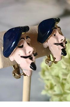 "Schiaparelli unsigned Wonderful Vintage 1950s Clip On Earrings of her friend, the late surrealist artist Salvador Dali! Too CUTE! These are  A-Dor-ABLEFired Enamel Salvador Dali faces complete with his iconic mustache, goatee and beret!  They are unsigned and functional!    Light wear to the enamel; please enlarge photos! Each clip back earring Measures: 1 \" tall x 1/2\" wide" Vintage Enamel Earrings For Evening, Vintage Style Enamel Earrings For Evening, Vintage Style Enamel Earrings For Evening Wear, Vintage Enamel Clip-on Earrings For Evening, Unique Evening Clip-on Earrings, Unique Clip-on Earrings For Evening, Vintage Enamel Party Earrings, Golden Valley, Vintage Makeup