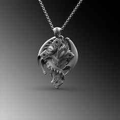 This expertly crafted Silver Dragon Cross Pendant necklace casts a spell of captivation on all those who wear it! A bold piece for anyone who loves Mythical Jewelry . Buy for yourself or give it as a gift for that special someone in your life! ★Item Details ◆ Material : 925K Sterling Silver ◆ Pendant Height : 1.18 inch x 3 cm ◆ Bail Height : 0.39 inch x 1 cm ◆ Bail With : Suitable for up to  0.19 inch x 5.00 mm Chain ◆ Rolo Chain Thickness : 0.059 inch x 1.5 mm | Foxtail Chain Thickness : 0.078 inch x 2 mm ◆ Pendant Weight : 19 Grams ◆ Rolo Chain Weight : 18 Inches - (45cm) = 4.50 Gr 20 Inches - (50cm) = 5Gr 22 Inches - (55cm) = 5.50 Gr 24 Inches - (60cm) = 6.05 Gr 26 Inches - (65cm) = 6.60 Gr 28 Inches - (70cm) = 7.12 Gr ◆ Foxtail Large Chain Weight / 28 Inches - (70cm) : 15 gr ◆ Chain Th Fantasy Metal Necklaces For Collectors, Silver Pendant Jewelry For Fantasy Events, Fantasy Pendant Jewelry For Fantasy Events, Fantasy Dragon Design Necklace, Fantasy Silver Necklace With Round Pendant, Fantasy Silver Round Pendant Necklace, Silver Round Pendant Necklace In Fantasy Style, Medieval Pendant Jewelry For Collectors, Medieval Pendant Collectible Jewelry