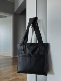 Vegan Leather Bag Metallic Black - our absolute hit ❤️ Its unique design makes it stand out from other exclusive bags 👜 In addition, the perfectly designed interior allows for the perfect arrangement of all the necessary things, which makes life easier and allows you to enjoy every moment to the fullest! ✅- waterproof eco leather shopper💧 ✅- closes with a zipper ✅- the two outer pockets also close with a zip ✅- convenient organization inside the bag, additionally it has three pockets ✅- capacious, easily fits a 15.6-inch laptop 💻 ✅- stands out from other stylish handbags Dimensions: - Width: 42 cm - Height: 38 cm - Depth: 8 cm - Handles: 70 cm 👌Fit A4 format.👌 🤗 Material and care: Sealed and waterproof eco-leather (surface: 100% polyurethane / base fabric: 80% cotton, 20% polyester) Black Tote Laptop Bag For Everyday Use, Black Tote Bag With Laptop Sleeve, Modern Black Tote Laptop Bag, Modern Black Laptop Bag Tote, Trendy Black Bag With Laptop Sleeve, Trendy Black Bags With Laptop Sleeve, Shopping Tote Shoulder Bag With Laptop Sleeve, Tote Shoulder Bag With Laptop Sleeve For Shopping, Black Leather-handled Laptop Tote Bag