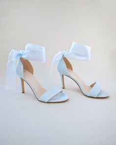 "Classic satin high heel sandals adorned adorned with matching satin or sheer ribbons that ties to an oversized bow around ankle to add dancerly grace to any ensemble. The light blue color can easily be your something blue. Simple and easy wear for bridal wear, bridesmaids, holiday party, wedding parties, and any special occasions.  DETAILS: HEEL HEIGHT: 3.5 Inches COLORS AVAILABLE: Ivory, Light Blue, Champagne, White, Fuchsia UPPER: Synthetic upper and lining MATERIALS: Manmade outsole STYLE NAME: DEMI Not sure of which size to purchase? Shoes measurements are as follow: (Please note measurements taken the length of inside of shoe from toe to heel). Size 6 - 9.25\" Size 7 - 9.5\" Size 8 - 9.75\" Size 9 - 10\" Size 10 - 10.25\" Size 11 - 10.5\" Please note all these info are intended for g