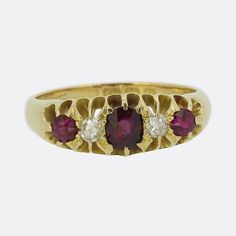 This is an Edwardian 18ct yellow gold ruby and diamond five-stone ring. A trio of mid to dark red rubies dominate the face with a single round old cut diamond separating each. The stones are all original and claw set in position. Condition: Used (Very Good) Weight: 3.9 grams Ring Size: L 1/2 (52) Rubies: Approx. 0.45 carats (0.25, 0.10, 0.10) Total Diamond Weight: Approx. 0.16 carats (0.08 carats each) Hallmarked: 18ct, Birmingham, 1912 Period: Edwardian Box: Plain gift box Check out my shop to Antique Ruby Ring, Ruby Wedding Rings, Half Eternity Ring Diamond, Platinum Chain, Antique Jewelry Rings, Vintage Fine Jewelry, Half Eternity Ring, Diamond Star, European Cut Diamonds