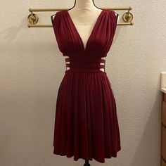 Burgundy Wine-Plunging V-Neck Gladiator Dress With Zipper In The Back. Mid-Length Dress With Cutout Details On The Sides & Flattering Top. Very Flowy & Beautiful. Make An Offer On Any Item. I’ll Accept Or Counter With My Lowest! You Can Also Bundle For A Fabulous Discount Or Buy 4 Items And Get A 5th Free @ Equal Or Lesser Price! Chic Burgundy V-neck Mini Dress, Burgundy V-neck Mini Dress For Summer, Summer Burgundy V-neck Mini Dress, Burgundy V-neck Mini Dress For Cocktail, Burgundy V-neck Dress For Date Night, Burgundy V-neck Mini Dress For Date Night, Green Sequin Dress, Beautiful Mini Dresses, Choker Dress