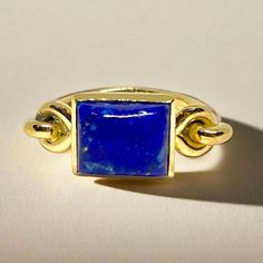 This gorgeous ring is both stately and whimsical, and is based on a Roman example dating to the second century AD. The delicately rounded shank gently holds a rectangular cabochon stone in a tall bezel setting. "Salus" means "health." Gently Holds, Jewelry Catalog, Blue Lapis Lazuli, Aqua Chalcedony, Blue Lapis, Red Agate, Quartz Rose, Red Garnet, Purple Amethyst