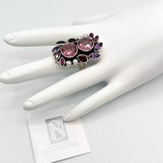 Brand New Nicky Butler One Of A Kind 925 Sterling Silver Pink Quartz Doublet Multi Gem Bold Statement Ring. Nicky Butler's Artistry Shines In This One Of A Kind Elongated Statement Ring With Faceted Amethyst & Rhodolite Garnet Gems And Lovely Freshwater Pearls Embracing Two Checker-Cut Pink Quartz Doublets! Size: 7.5 (See Photos) Gemstone Information: Pink Quartz Doublet: Two Round Shape 11 Mm (1.30 Ct) Amethyst: 4 Marquise Shape 4 Mm X 8 Mm Garnet: 2 Pear Shape 5 Mm X 7 Mm Rhodolite Garnet: 4 M India Crafts, Garnet Gem, Rhodolite Garnet, Pink Quartz, Pear Shape, Womens Jewelry Rings, Statement Ring, Black Velvet, Round Shape