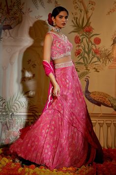 Rani pink lehenga with attached cancan and bandhani print. Paired with gota embroidered padded blouse and dupatta.
Component: 3
Pattern: Printed
Type Of Work: Bandhani
Neckline: V neck
Sleeve Type: Sleeveless
Fabric: Blouse and Lehenga - Crepe Silk, Dupatta - Net
Color: Pink
Other Details: 
Embroidered waistband
Scallop bordered dupatta
Occasion: Destination Wedding - Aza Fashions Pink Bandhani Print Pre-draped Saree For Festivals, Designer Bandhani Print Pink Saree, Designer Pink Saree With Bandhani Print, Designer Pink Bandhani Print Saree, Pink Gota Work Lehenga For Eid, Pink Lehenga With Gota Work For Eid, Pink Gota Work Palazzo Set For Navratri, Pink Gota Work Choli For Eid, Pink Kundan Lehenga For Eid