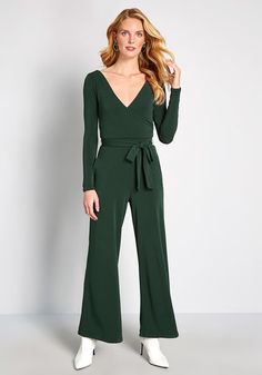 Highlight your propensity for polish with this dark green jumpsuit from our ModCloth namesake label! Crafted from a stretch-infused crepe fabric, and detailed with long sleeves on either side of the surplice neckline, a sleek waist sash, and essential pockets, this wide-leg one piece is a surefire stunner for casual outings and swanky occasions alike. Dark Green Jumpsuit, Plus Size Vintage Dresses, Waist Sash, Jumpsuit Elegant, Green Jumpsuit, Long Sleeve Jumpsuit, Crepe Fabric, Vintage Style Outfits, Jumpsuits For Women