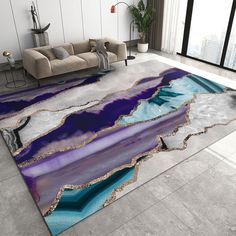 a living room with a couch and rug in the shape of an abstract painting on the floor