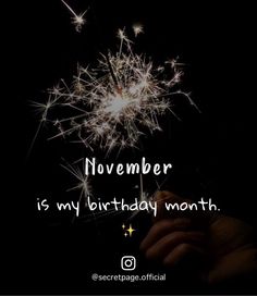 someone holding a sparkler in their hand with the words november is my birthday month