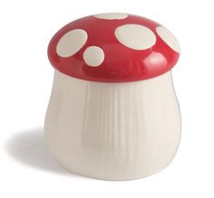 a red and white mushroom shaped object on a white background