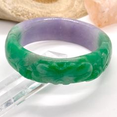 Lavender Multicolor Jadeite Jade Chinese Hand Carved 59mm Bangle Bracelet Beloved For Its Deep, Diverse Variations Of Color, Alluring Luster, And Remarkable Durability, The Jade Stone Has Captivated Hearts And Minds For Centuries. Its Earliest Uses Date Back To The Stone Age, When Civilizations Painstakingly Crafted Sharp Axe Heads And Traded Carved Jade Objects As Currency. Master Craftsmen Across Centuries And Cultures Have Fashioned A Swath Of Objects From The In-Demand Stone, Including Jade Jade Wedding, Tiffany Earrings, Open Cuff Bracelet, Turquoise Accents, Carved Jade, Crystal Beads Bracelet, Stone Age, Jade Carving, Jade Jewelry