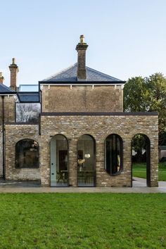 Pill shape arched windows in frameless glass to Old rectory Victorian Hallway, British Homes, Shaped Windows, Window Projects, House Extension Design, Vernacular Architecture, Curved Staircase, Old Windows