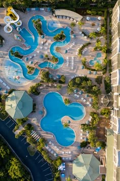 an aerial view of the pool and surrounding buildings