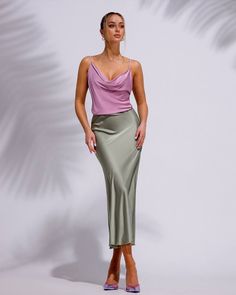 "Classic and trendy silk midi high-waisted skirt. It's elegant and sophisticated, there's nothing to add or remove, simple but at the same time unique. DETAILS - hits at mid-calf - high-waisted - solid color - elastic waistband - bias cut - relaxed fit silk top can be bought from us in the section \"tops\" Material  Silk and polyester blend SIZES Available in 2 sizes: XS-S, M-L XS-S = 2/4 US numeric  WAIST 23-26 inches or 59-67 cm HIPS 33-37 inches or 86-94 cm   M-L = 6/8 US numeric  WAIST 26-29.5 inches or 68-75 cm HIPS 37-41 inches or 94-104cm PAYMENT You can pay for your order with Paypal or using a credit card. Drop me a line, I'll send you an instruction from Etsy how to do it. SHIPPING Standard shipping is free to some countries. If you want to have express shipping, please upgrade w Chic High-waist Satin Skirt, Chic High Waist Satin Skirt, Long Feminine Lined Pencil Skirt, Feminine Long Lined Pencil Skirt, Elegant High-waist Flowy Skirt, Elegant High Waist Flowy Skirt, Elegant High Waist Satin Skirt, High Waist Pencil Skirt For Spring Evening, High Waist Satin Lined Skirt