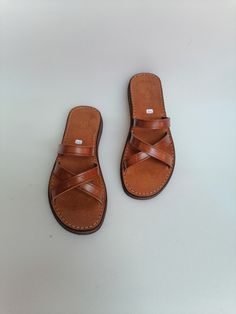 A beautiful 100% handcrafted women's sandal made with real leather and high quality organic material, perfect for sunny days, it is very comfortable and elegant. Soft and light, it is entirely handmade All manufacturing stages are carried out by hand All sizes are available ALL ORDERS ARE NOW SHIPPED VIA ARAMEX EXPRESS WORLDWIDE (please include a phone number at checkout, as it is required by the carrier). If you are unsure of your size, please contact me so I can help you. Wholesale Opportuniti Comfortable Natural Leather Sandals, Summer Barefoot Sandals With Leather Footbed, Casual Open Toe Barefoot Sandals In Natural Color, Summer Toe Loop Barefoot Sandals With Leather Footbed, Leather Barefoot Sandals For Vacation, Summer Barefoot Sandals With Leather Sole In Natural Color, Leather Huarache Sandals With Leather Lining For Summer, Leather Footbed Toe Ring Sandals For Summer, Leather Open Toe Slingback Summer Sandals