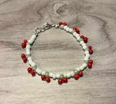 This cute cherry bracelet is perfect to compliment your outfit! Each bracelet is handmade and is made to order. It is a great addition to your everyday style! NOTE: Bracelets will begin shipping January 18th. Handmade Casual Charm Bracelet Gift, Casual Handmade Charm Bracelet Gift, Casual Beaded Bracelets With Lobster Clasp As Gift, Handmade Red Bracelets For Everyday, Casual Handmade White Charm Bracelet, Cherry Bracelet, Your Outfit, Everyday Style, Beauty Book