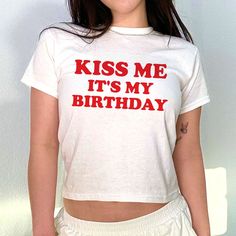 Kiss Me It's My Birthday 90s Baby Tee, Aesthetic Tee, Women's Fitted Tee, Unisex Shirt, Gift for Friend, Y2K Baby Tee, 90s Style Tee DETAILS - 100% cotton (fiber content may vary for different colors) - tear-away label  SIZING Sizes vary by shirt style. Please check the size chart before making your purchase. PLEASE NOTE: Our Baby tee is sized for a youth, reminiscent of the '90s-era shrunken-down T-shirt. This style, popularized by the skater/raver culture of the time, is not to be confused wit Birthday Tanks For Women, Kiss Me Its My Birthday, Fun Fitted T-shirt For Birthday, Vintage White T-shirt For Birthday, Trendy Text Print T-shirt For Birthday, Retro Short Sleeve T-shirt For Birthday, Retro Graphic Print T-shirt For Birthday, White Fitted T-shirt For Birthday, Summer Slogan Top For Birthday