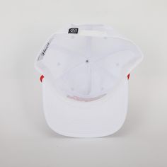 White Houston Cougars hat with Houston Cougars embroidered in red. Light weight nylon fabric Adjustable snapback closure Woven rope across the base of the front panel Unstructured front panel Officially Licensed University of Houston Hat White Adjustable Trucker Hat, White Adjustable Flat Bill Dad Hat, White Adjustable Fit Snapback Hat, White Adjustable Snapback Cap, White Adjustable Snapback Hat, White Adjustable Snapback Hat With Curved Brim, White Curved Brim Snapback Hat, White Flat Bill Dad Hat For Outdoor, White Sporty Dad Hat With Flat Bill