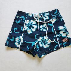 Nwot East Coast Surf Wear Floral Shorts Women's Size S Hibiscus Prints In Beautiful Cobalt Blue Measurements: Waist 13.5" Length 14" Inseam 2.5" From Smoke And Pet Free Home! Blue Fitted Surfing Shorts, Fitted Blue Surfing Shorts, Navy Beach Shorts, Navy Short Bottoms For Beach Season, Navy Shorts For The Beach, Blue High-waisted Shorts Swimwear For Beach, Blue High Waist Beachwear Shorts, High Waist Blue Beachwear Shorts, Blue Beachwear Shorts