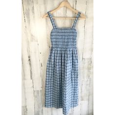 Nwt J Crew Smocked Sleeveless Dress In Textured Plaid Midi Blue Spring 2022 Xs Style: Bg455 Approximate Measurements: Bust: 12.75“ From Underarm To Underarm, Stretches To 16"+ Waist: 12" Across The Front, Stretches To 15"+ Length: 45” From Shoulder To Hem Tag May Have Been Marked To Prevent Store Returns And/Or May Have Been Partially Cut Or Detached. Price Tags May Have Stickers / Markings Or May Have Peeled Off Or Been Cut. Hanger Straps Might Be Damaged Due To Items Having Been In A Retail En Spring Smocked Midi Dress With Tie Straps, Sleeveless Smock Midi Cotton Dress, Sleeveless Cotton Smocked Dress With Ruched Detail, Casual Smocked Sleeveless Dress With Tie Straps, Sleeveless Smocked Dress With Tie Straps For Summer, Ruched Cotton Smocked Sundress, Cotton Ruched Smocked Sundress, Blue Smocked Bodice Sundress For Summer, Blue Sleeveless Smocked Summer Dress