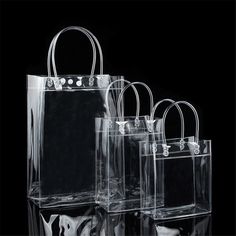 Main Material : PVC Item Type : shopping bags Color: Clear Weight: 60g Fit for: Travel, Office Equipment, Cosmetics Collection, Gift Packaging Package include1 x Clear Handbag Size: S 13*15*7cm M  17*23*7cm L 20*28*10cm Features: Durable PVC clear tote bag with snap. Suitable for workplaces that require clear bags and meets NFL and PGA Tournament guidelines. Hold camera, cell phone, hat, water bottle, and more. Works well for travel, students who need clear lunch bags, office workers, sports, an Transparent Handbags, Transparent Purse, Plastic Handbag, Clear Gift Bags, Plastic Gift Bags, Clear Handbags, Handbags Collection, Clear Tote Bags, Retail Bags