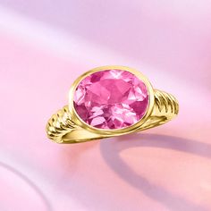 Ross-Simons - 6.30 Carat Pink Topaz Ring in 18kt Gold Over Sterling. Size 8. This sweet cocktail ring is sure to make you blush. In polished 18kt yellow gold over sterling silver, a 6.30 carat pink topaz oval is the perfect pop atop a fashionable rope shank! 3/8" wide. Pink topaz ring. Fine Jewelry Yellow Gold Solitaire Topaz Ring, Fine Jewelry Yellow Gold Topaz Ring, Yellow Gold Sterling Silver Topaz Ring, Fine Jewelry Yellow Gold Topaz Ring In Sterling Silver, 14k Yellow Gold Topaz Ring With Vs Clarity, Sweet Cocktail, Pink Topaz Ring, Sweet Cocktails, Turquoise Drop Earrings