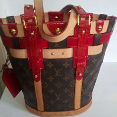 Authentic Louis Vuitton Rubis Neo Bucket Tote . Pre Owned Condition Shows Some Marks On The Leather And Wear On The Decorative. Trimming , Still Spectacular Piece Check The Photos Luxury Red Bucket Bag Tote, Ll Bean Boots, Rare Louis Vuitton Handbags, Louis Vuitton Neverfull Damier, Louis Vuitton Epi Bucket Bag, Luxury Red Bucket Bag With Gold-tone Hardware, Louis Vuitton Bucket Bag Vintage, Cowhide Handbags, Louis Vuitton Neverfull Gm