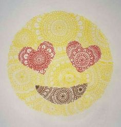 a drawing of a smiley face with hearts on it