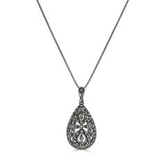 Elegant, sterling silver decorative teardrop pendant. A wonderful example of the hand crafting skill of our artisans. With exquisite detailing, inlaid with lustrous marcasite stones, suspended from a decorative pendant bail, for a sophisticated vintage inspired look. Comes with an oxisided chain. Why oxidised? It is a chemical process that our sterling silver chains go through to give a slightly darker / vintage appearance. Dimensions 42mm x 20mm (including bail). Elegant Filigree Teardrop Pendant Jewelry, Formal Engraved Teardrop Pendant Necklace, Ornate Silver Teardrop Pendant Jewelry, Silver Teardrop Pendant Necklace Stamped 925, Sterling Silver Teardrop Pendant With Intricate Design, Sterling Silver Teardrop Necklace With Oxidized Finish, Elegant Engraved Teardrop Pendant Jewelry, Silver 925 Stamped Teardrop Pendant Necklace, Elegant Silver Oval Drop Necklace