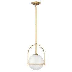 a light fixture with a white glass ball hanging from it's center point and gold metal frame