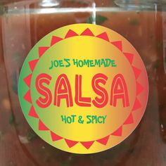 a jar filled with hot and spicy salsa