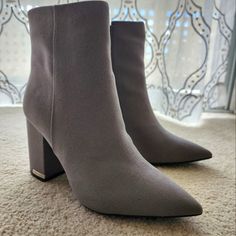 Elephant Grey Above Ankle Boots With Silver Tone Accent And Zipper. Dress Up Your Wardrobe For A Classic Look. Trendy Gray Pointed Toe Boots, Calvin Klein Round Toe Heels For Fall, Calvin Klein Fall Heels With Round Toe, Calvin Klein Fall Round Toe Heels, Calvin Klein Pointed Toe Boots For Fall, Gray Pointed Toe Boots For Spring, Spring Gray Pointed Toe Boots, Above Ankle Boots, Calvin Klein Boots